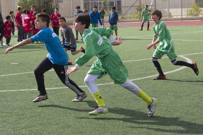 Jewish and Arab teenagers play soccer together (Credit: Herlinde Koelbl)