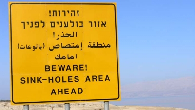 Beware! Sinkholes at the Dead Sea (credit: Wikimedia) 